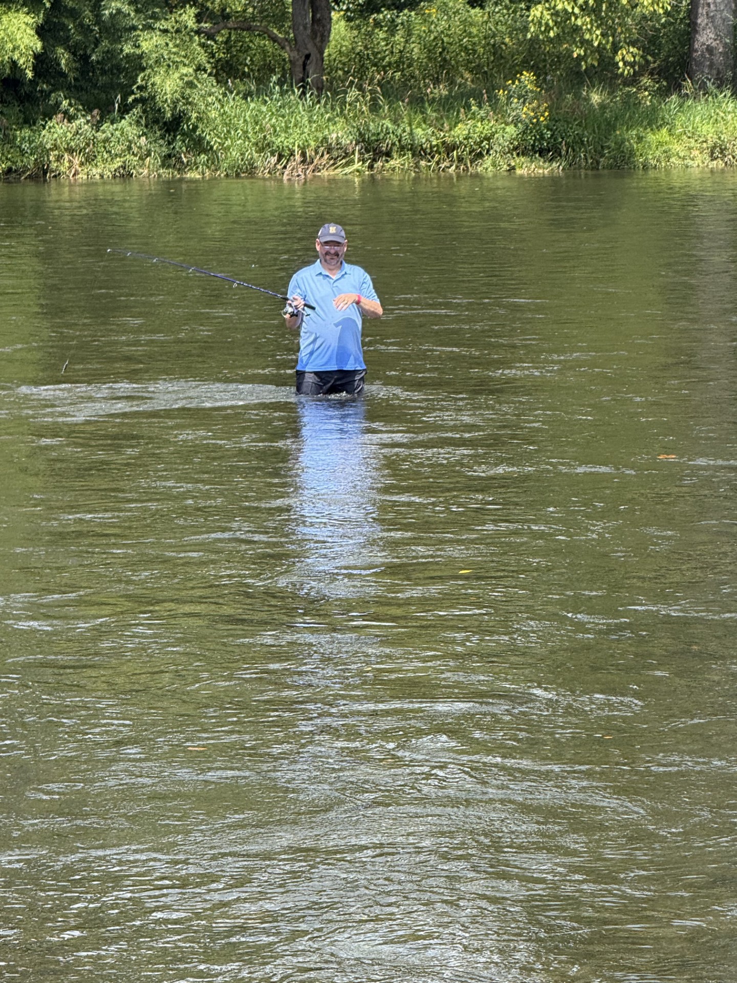 Bruce wading the Watauga, full river behind