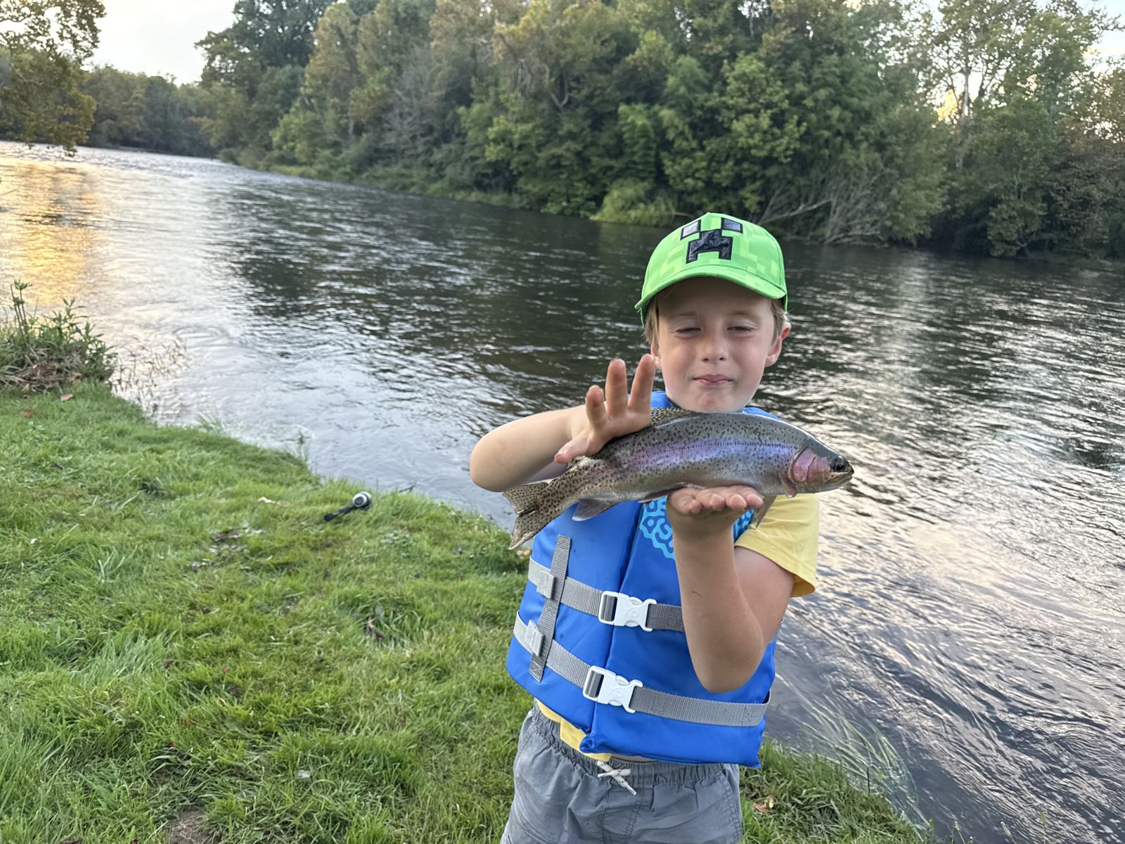 Rudy with rainbow off the dock